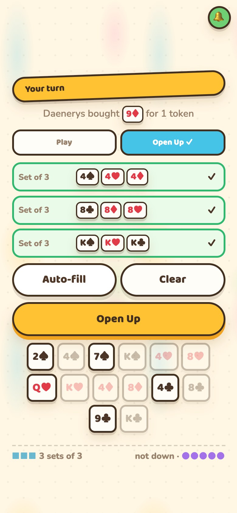 A phone building a contract: three slots each holding a set of three with a green tick, an Auto-fill and Clear button, an Open Up button, and the hand below with the cards used greyed out
