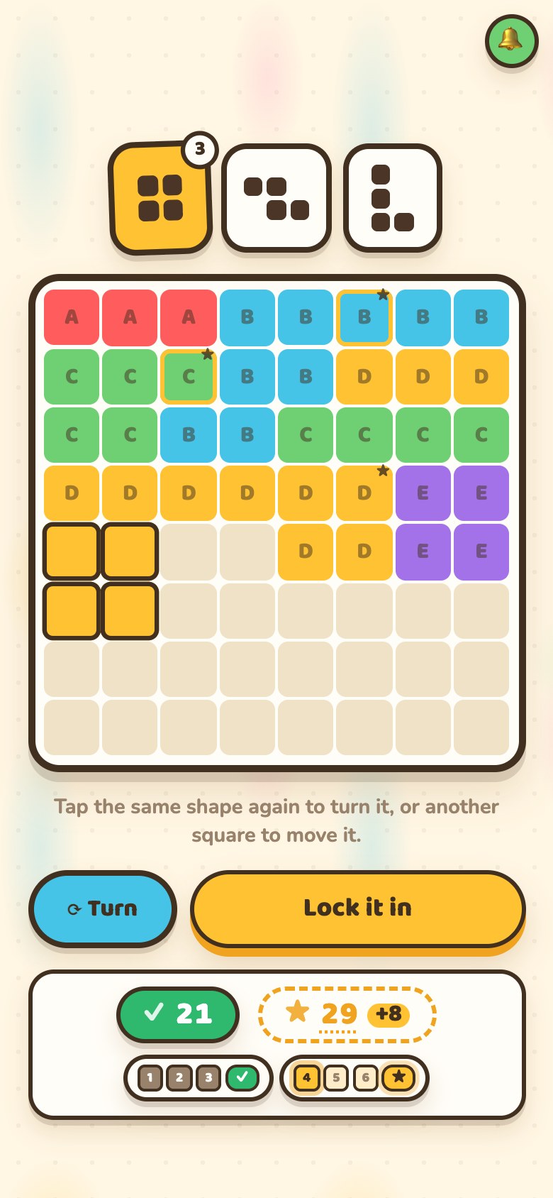A phone with the three shape cards, a board showing a four-square preview in the player's own colour lined up on bare ground, Turn and Lock it in buttons, and two coins beneath reading 21 banked and 29 on the board with a plus 8 badge